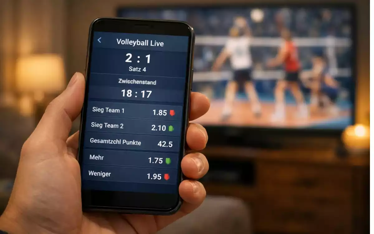 Smartphone zeigt Live-Wettquoten während eines Volleyballspiels